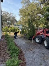 Water Oak Irrigation crew preparing ground and installing new sod at a Westchase FL property